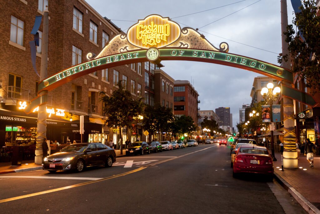 In downtown San Diego, California, the Historic Gaslamp Quarter showcases its storied charm with elegant historical buildings and the iconic arch sign, offering a glimpse into the city's rich past and vibrant present.