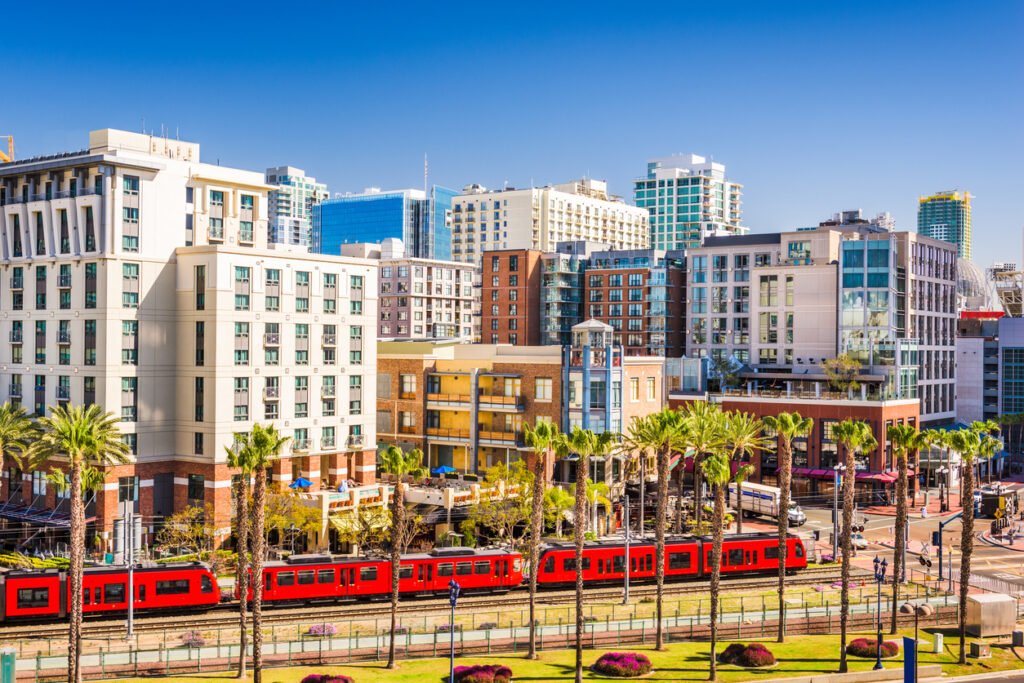 The vibrant cityscape of San Diego, California, unfolds in the historic Gaslamp Quarter, where colorful buildings and bustling streets captivate visitors with a blend of modernity and charm.